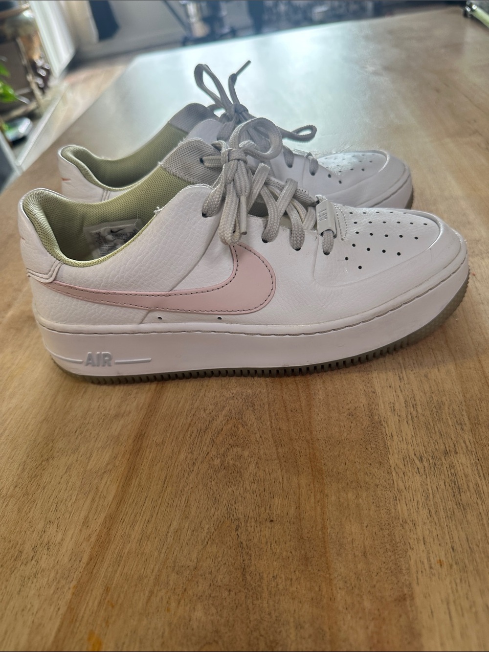 Nike Women’s White Sneakers with Pink Swoosh